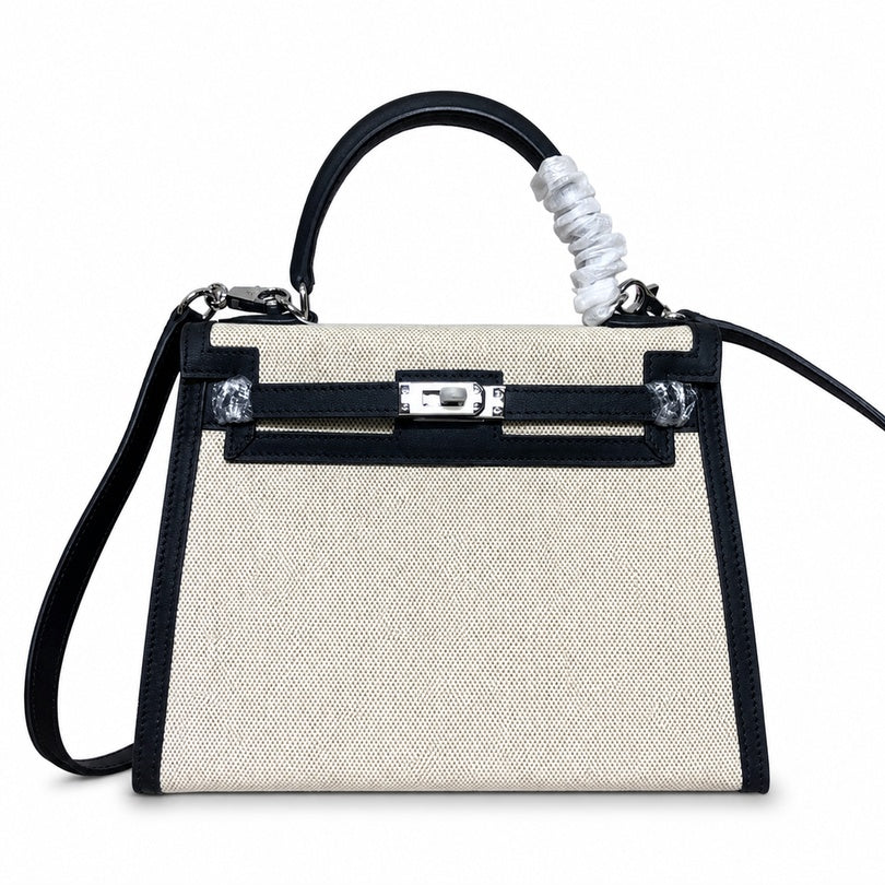 Kelly 25cm Patchwork Canvas and Swift Leather in Black — Polished Structured Handbag