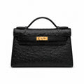 Mini Kelly Sellier 22cm Noir Ostrich Leather Gold Hardware — Small Structured Carry Style