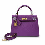 Kelly Sellier 25cm Violine Ostrich Gold Hardware Luxury Commute — Streamlined Top-Handle Handbag