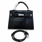 Kelly Sellier 22cm Noir Shiny Crocodile Leather Gold Hardware & Palladium Hardware — Classic Hand-Carry Silhouette