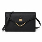 Kelly Elan 25x6.5x15cm Underarm Baguette Bag in Black with Gold Hardware — Streamlined Elan Carry Design