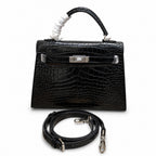 Kelly Sellier 22cm Noir Shiny Crocodile Leather Gold Hardware & Palladium Hardware — Classic Hand-Carry Silhouette