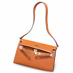 Kelly Elan 25x6.5x15cm Underarm Baguette Bag in Brown with Gold Buckle — Distinctive Elongated Handbag