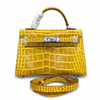 Kelly Sellier 19cm Jaune Ambre Shiny Crocodile Leather Gold Hardware & Palladium Hardware — Structured Top-Handle Handbag