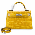 Kelly Sellier 19cm Jaune Ambre Shiny Crocodile Leather Gold Hardware & Palladium Hardware — Structured Top-Handle Handbag