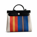 Elegant Canvas-and-Leather Bag: Herbag 31cm Saddle-Inspired Canvas Body with Leather Handle and Shoulder Strap