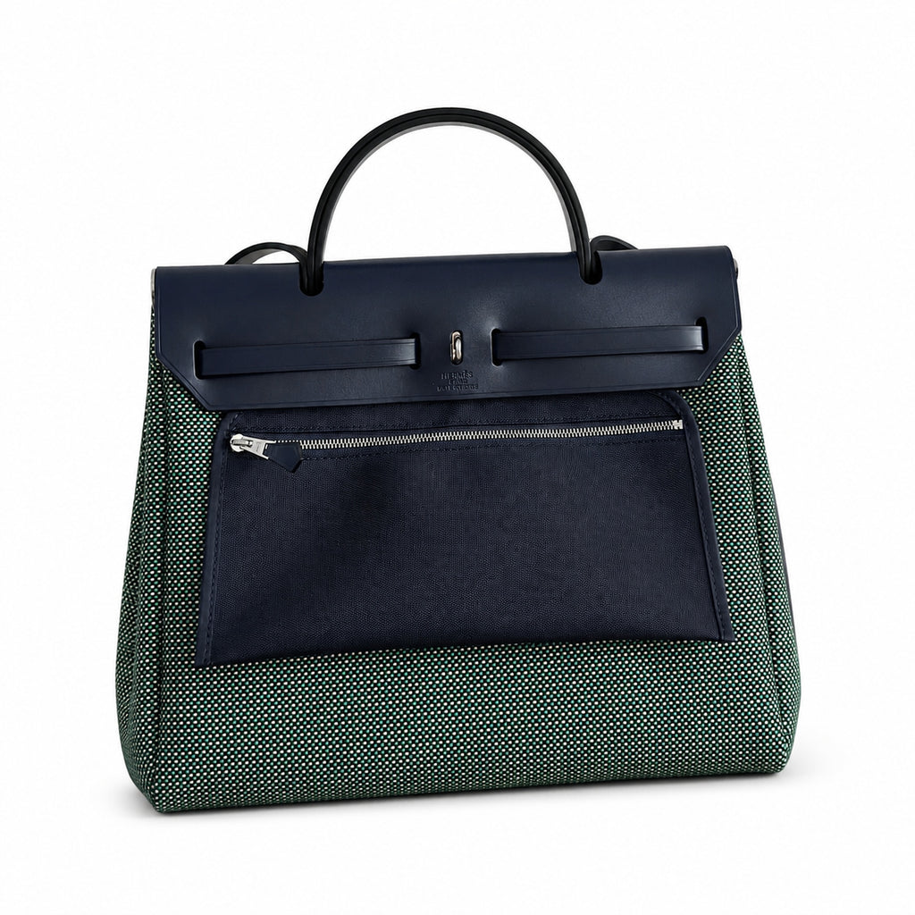 Herbag 31cm Saddle-Inspired Canvas Body with Leather Handle and Shoulder Strap — Elegant Canvas-and-Leather Hand-Carry Bag