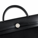 Sophisticated Canvas Carryall: Herbag 31cm Saddle-Inspired Canvas Body with Leather Handle and Shoulder Strap