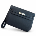 Convertible Clutch: Kelly Depeches 25cm Togo Leather with Shoulder Strap