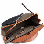 Distinctive Saddle-Inspired Handbag: Herbag 31cm Saddle-Inspired Canvas Body with Leather Handle and Shoulder Strap