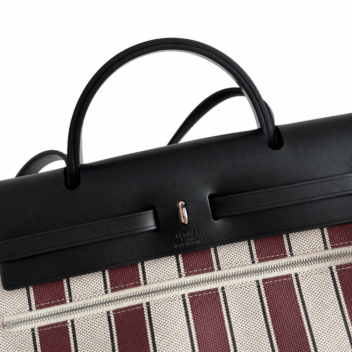 Saddle-Influenced Canvas Hand-Carry Style: Herbag 31cm Saddle-Inspired Canvas Body with Leather Handle and Shoulder Strap