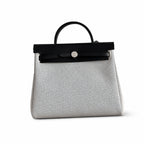 Herbag 31cm Saddle-Inspired Canvas Body with Leather Handle and Shoulder Strap — Polished Saddle-Inspired Carryall