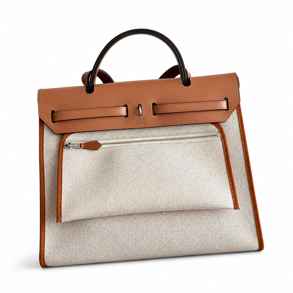 Canvas Body and Leather Trim Design: Herbag 31cm Saddle-Inspired Canvas Body with Leather Handle and Shoulder Strap