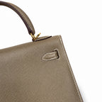 Kelly 25 Elephant Gray Epsom Gold Buckle, fully handmade with wax thread — Classic Hand-Carry Silhouette