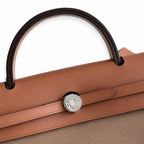 Herbag 31cm Saddle-Inspired Canvas Body with Leather Handle and Shoulder Strap — Structured Leather-Trimmed Canvas Carryall