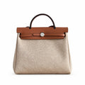 Structured Leather-Trimmed Canvas Carryall: Herbag 31cm Saddle-Inspired Canvas Body with Leather Handle and Shoulder Strap