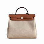 Structured Leather-Trimmed Canvas Carryall: Herbag 31cm Saddle-Inspired Canvas Body with Leather Handle and Shoulder Strap