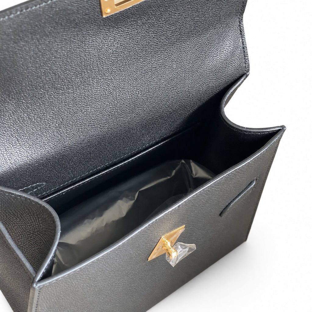 Kelly Double-Sided Epsom Leather in Black with Gold Buckle — Refined Reversible Carry Design