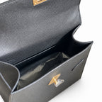 Kelly Double-Sided Epsom Leather in Black with Gold Buckle — Refined Reversible Carry Design