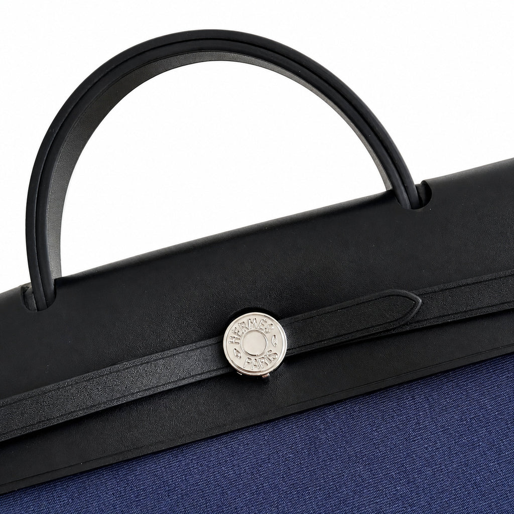 Canvas-and-Leather Top-Handle Style: Herbag 31cm Saddle-Inspired Canvas Body with Leather Handle and Shoulder Strap
