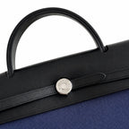 Canvas-and-Leather Top-Handle Style: Herbag 31cm Saddle-Inspired Canvas Body with Leather Handle and Shoulder Strap