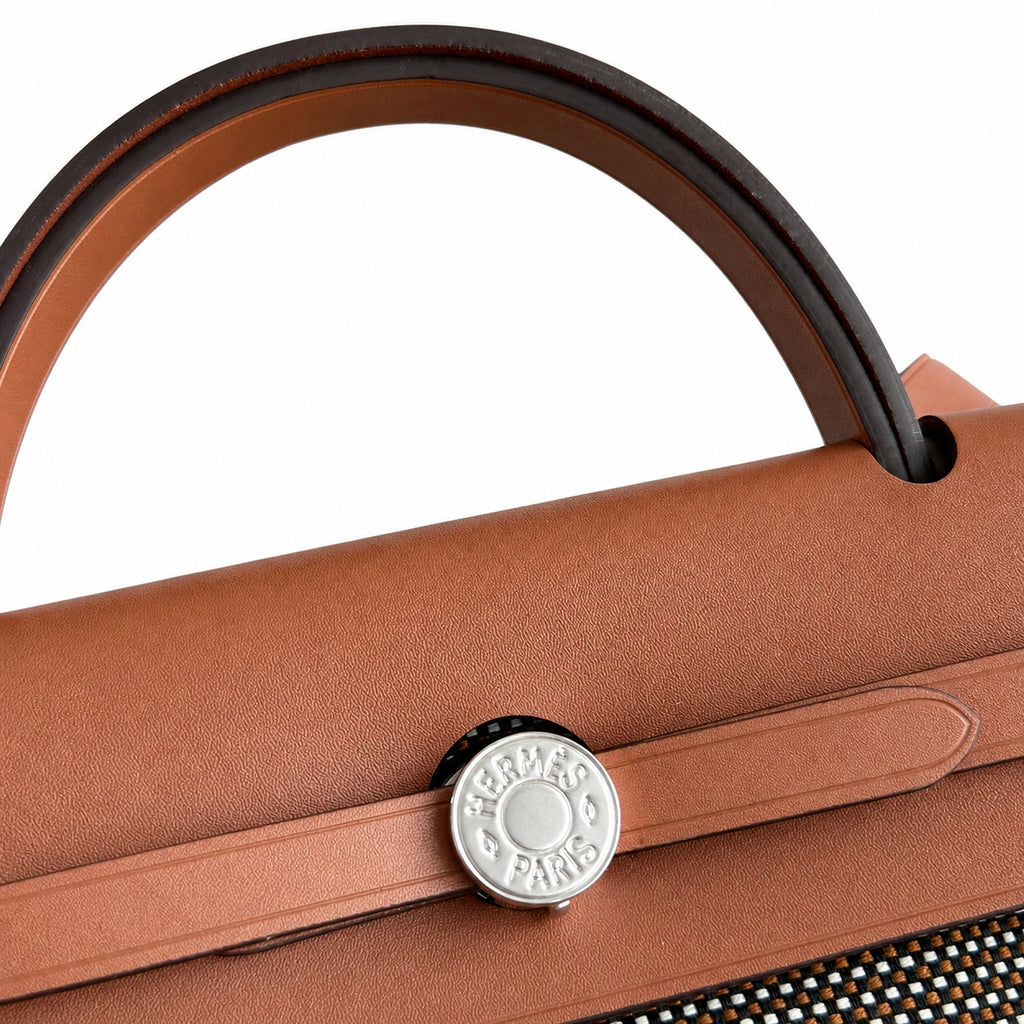 Distinctive Saddle-Inspired Handbag: Herbag 31cm Saddle-Inspired Canvas Body with Leather Handle and Shoulder Strap
