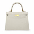 Kelly 25 Milkshake White Epsom Gold Buckle handmade with wax thread — Distinctive Hand-Carry Bag
