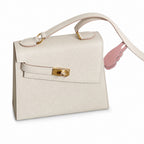 Kelly Double-Sided Epsom Leather in Milkshake White with Gold Buckle — Refined Reversible Carry Design