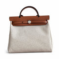 Herbag 31cm Saddle-Inspired Canvas Body with Leather Handle and Shoulder Strap — Distinctive Saddle-Inspired Handbag