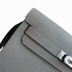 Sophisticated Compact Carry: Kelly Depeches 25cm Togo Leather with Shoulder Strap