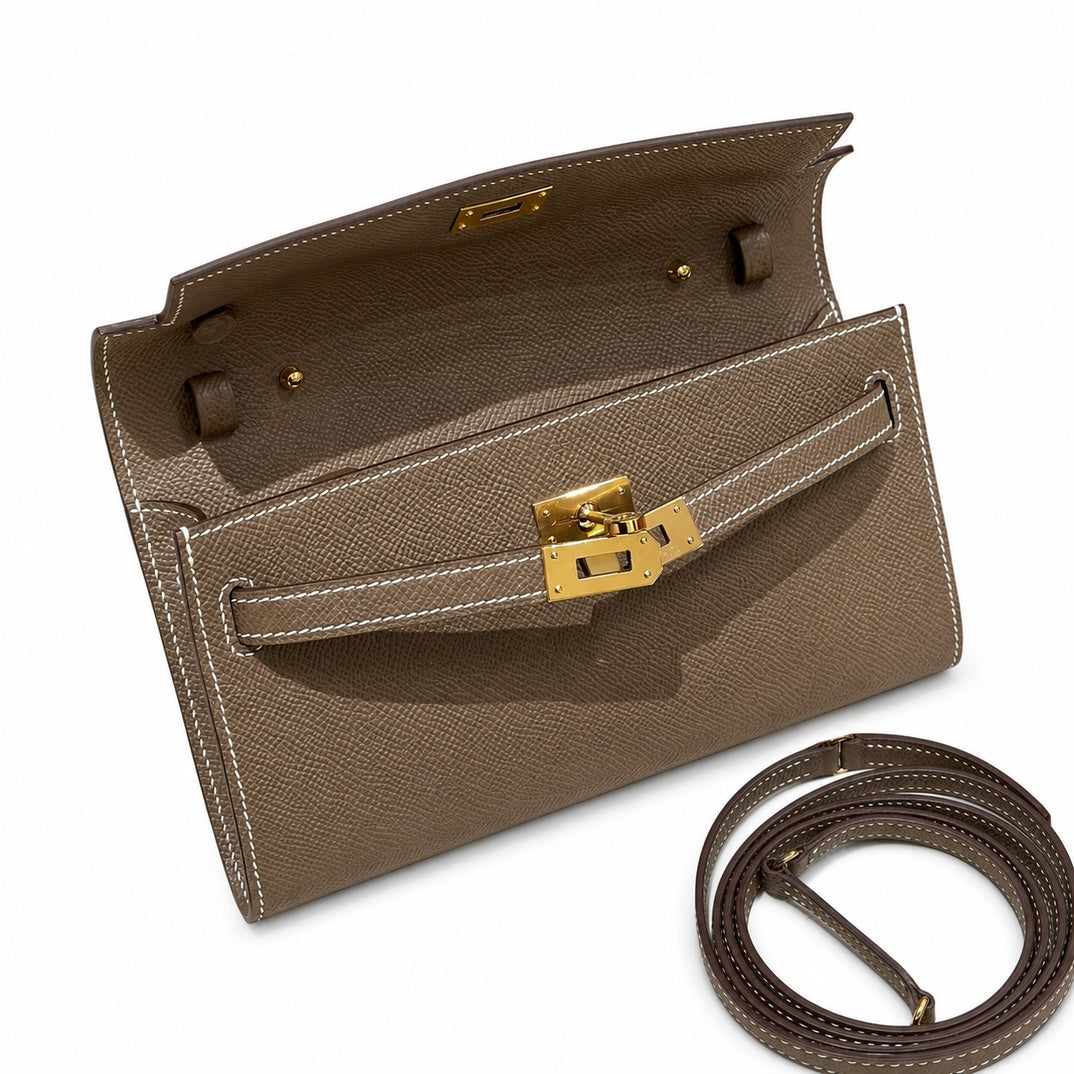 Kelly to go Color: ck18/etoupe Size: 19*11.5*1.5cm Leather: Epsom Hardware: Gold Kelly shoulder crossbody bag, Elephant Gray, cowhide, Gold Buckle — Refined Small Hand-Carry Bag