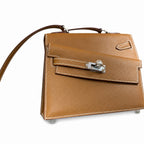 Kelly Double-Sided Epsom Leather in Gold Brown with Silver Buckle — Refined Reversible Carry Design