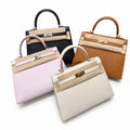 Epsom Kelly 25 1⃣ Black Silver 2⃣ Golden Brown Gold 3⃣ 09 Fantasy Pink Silver 4⃣ Milkshake Platinum — Polished Structured Handbag