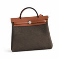 Distinctive Saddle-Inspired Handbag: Herbag 31cm Saddle-Inspired Canvas Body with Leather Handle and Shoulder Strap