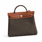 Distinctive Saddle-Inspired Handbag: Herbag 31cm Saddle-Inspired Canvas Body with Leather Handle and Shoulder Strap