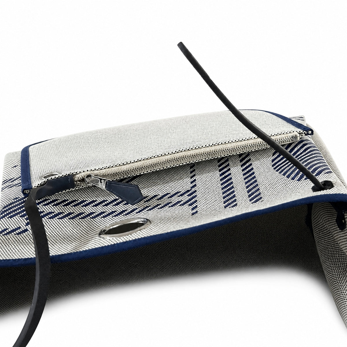 Distinctive Leather-Trimmed Canvas Design: Herbag 31cm Saddle-Inspired Canvas Body with Leather Handle and Shoulder Strap