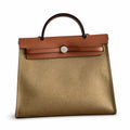 Herbag 31cm Saddle-Inspired Canvas Body with Leather Handle and Shoulder Strap — Polished Canvas-and-Leather Handbag