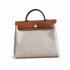 Canvas Shoulder Bag with Leather Accents: Herbag 31cm Saddle-Inspired Canvas Body with Leather Handle and Shoulder Strap