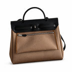 Refined Canvas Body with Leather Details: Herbag 31cm Saddle-Inspired Canvas Body with Leather Handle and Shoulder Strap