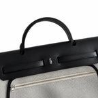 Herbag 31cm Saddle-Inspired Canvas Body with Leather Handle and Shoulder Strap — Refined Canvas Body with Leather Details