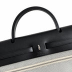 Herbag 31cm Saddle-Inspired Canvas Body with Leather Handle and Shoulder Strap — Elegant Canvas-and-Leather Bag