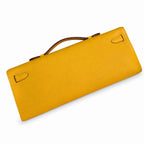 Slim Evening Clutch: Kelly cut clutch, evening bag, Epsom Leather, wax thread hand-sewing, amber yellow, Gold Buckle