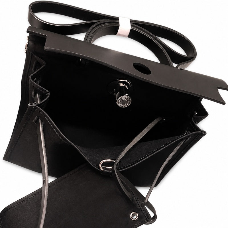 Refined Saddle-Inspired Carry Design: Herbag 31cm Saddle-Inspired Canvas Body with Leather Handle and Shoulder Strap