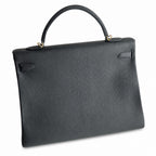Kelly in Black Togo Leather with Gold Buckle Handmade — Structured Top-Handle Handbag
