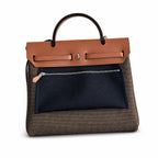 Distinctive Saddle-Inspired Handbag: Herbag 31cm Saddle-Inspired Canvas Body with Leather Handle and Shoulder Strap