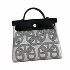 Herbag 31cm Saddle-Inspired Canvas Body with Leather Handle and Shoulder Strap — Saddle-Influenced Canvas Hand-Carry Style