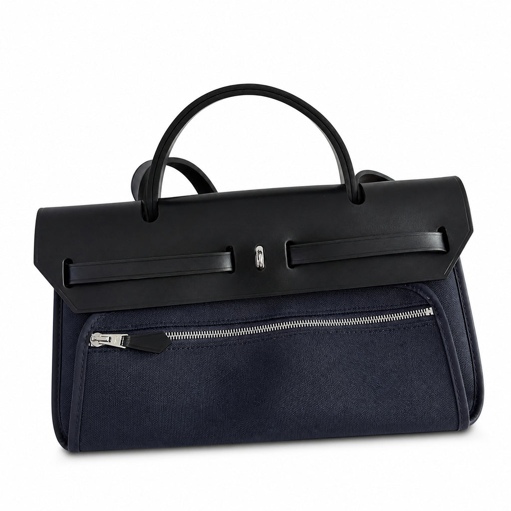 Herbag 31cm Saddle-Inspired Canvas Body with Leather Handle and Shoulder Strap — Distinctive Leather-Trimmed Canvas Design