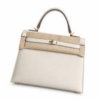Milkshake White, Gold Buckle and Silver Buckle, Kelly 25, imported Epsom — Polished Structured Handbag