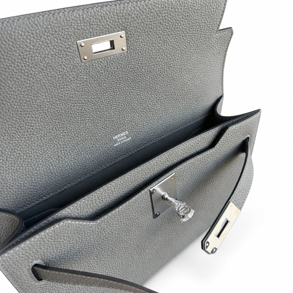 Sophisticated Compact Carry: Kelly Depeches 25cm Togo Leather with Shoulder Strap