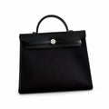 Sophisticated Canvas Carryall: Herbag 31cm Saddle-Inspired Canvas Body with Leather Handle and Shoulder Strap
